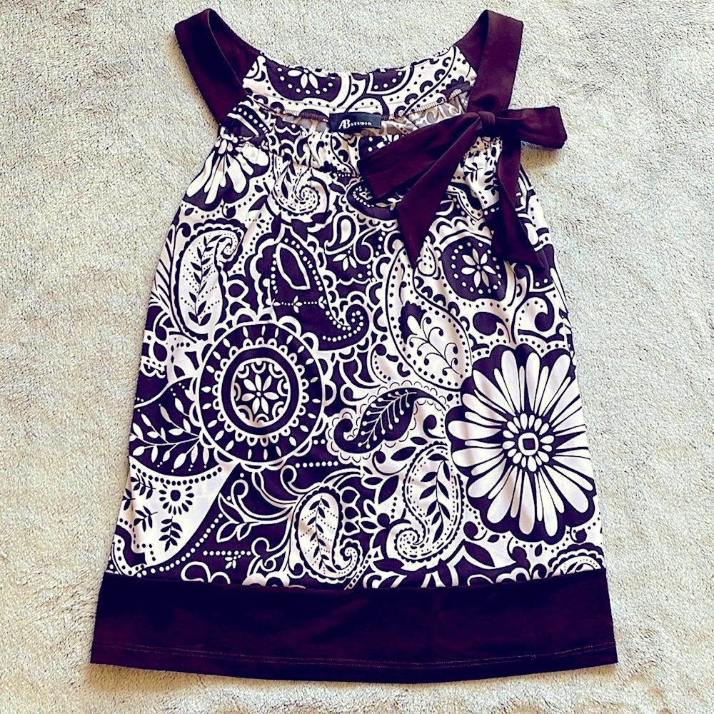 Brown and white cute summer top with tie bow on side top.  Size S.